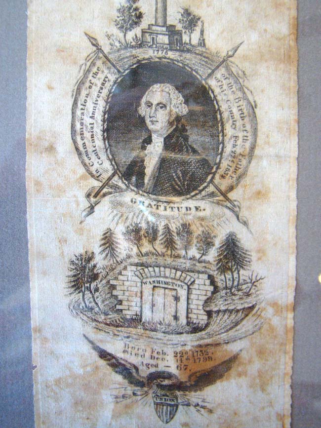 A RARE early 19th century George Washington Memorial silk banner